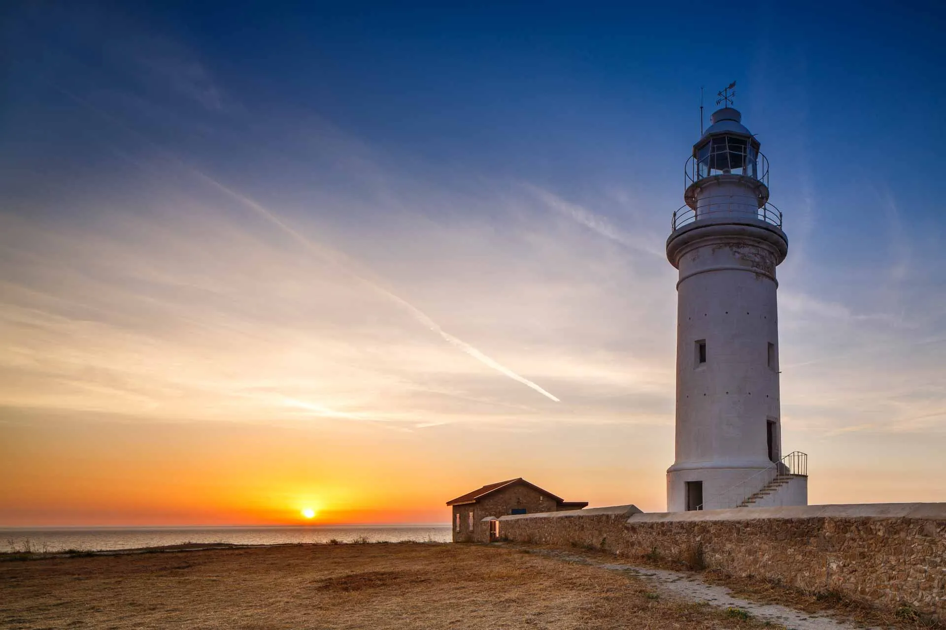 Solnedgang ved fyret i Paphos arkeologiske park