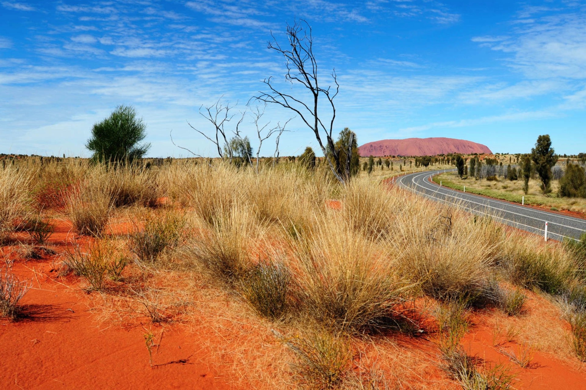 Ayers Rock endrer farge etter solens gang