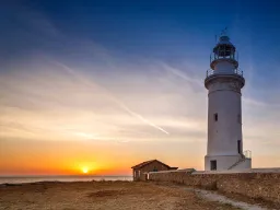 Solnedgang ved fyret i Paphos arkeologiske park