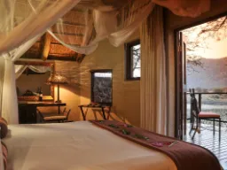 Bungalow med utsikt på Tau Game Lodge i Madikwe viltreservat Bungalow med utsikt på Tau Game Lodge i Madikwe viltreservat